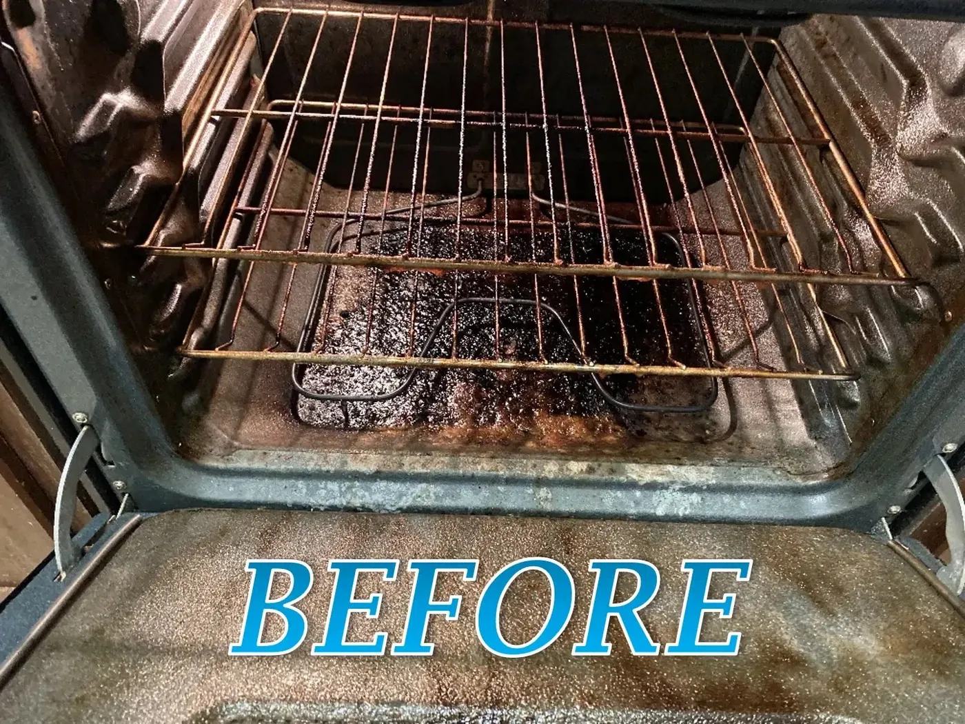 Oven interior before cleaning, with baked-on grease and burnt residue on the floor and racks